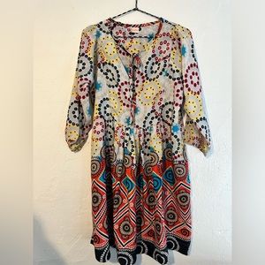 Size M/L Wear Guru vibrant colored smock dress made in India.
